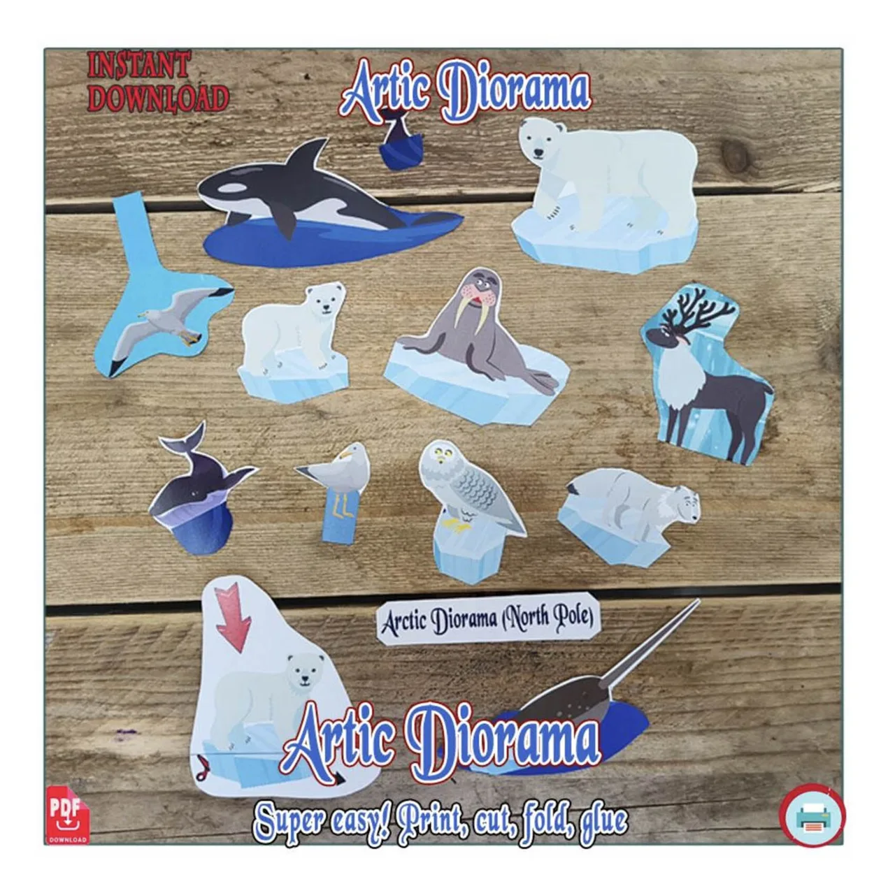 Cut-out Arctic paper animals ready for a polar habitat shoebox diorama