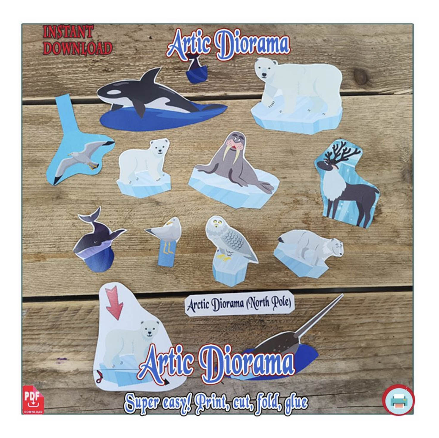 Cut-out Arctic paper animals ready for a polar habitat shoebox diorama