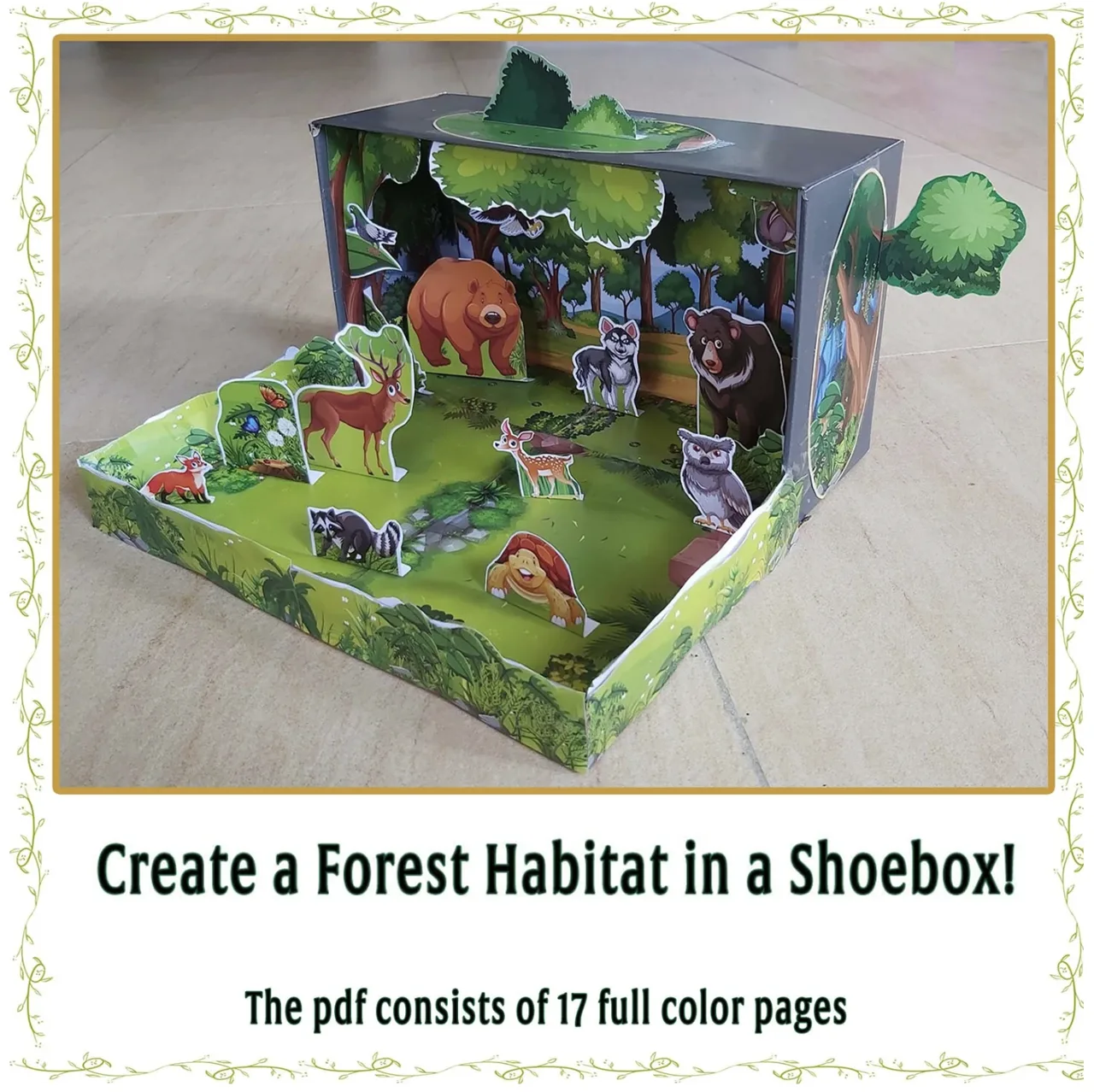 Completed forest habitat diorama with woodland animals, trees and layered forest scenery
