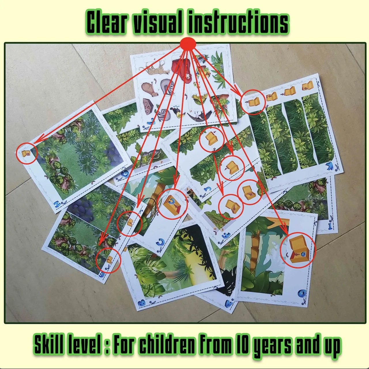 Printed rainforest diorama pages with visual assembly symbols and arrows showing where the project pieces fit