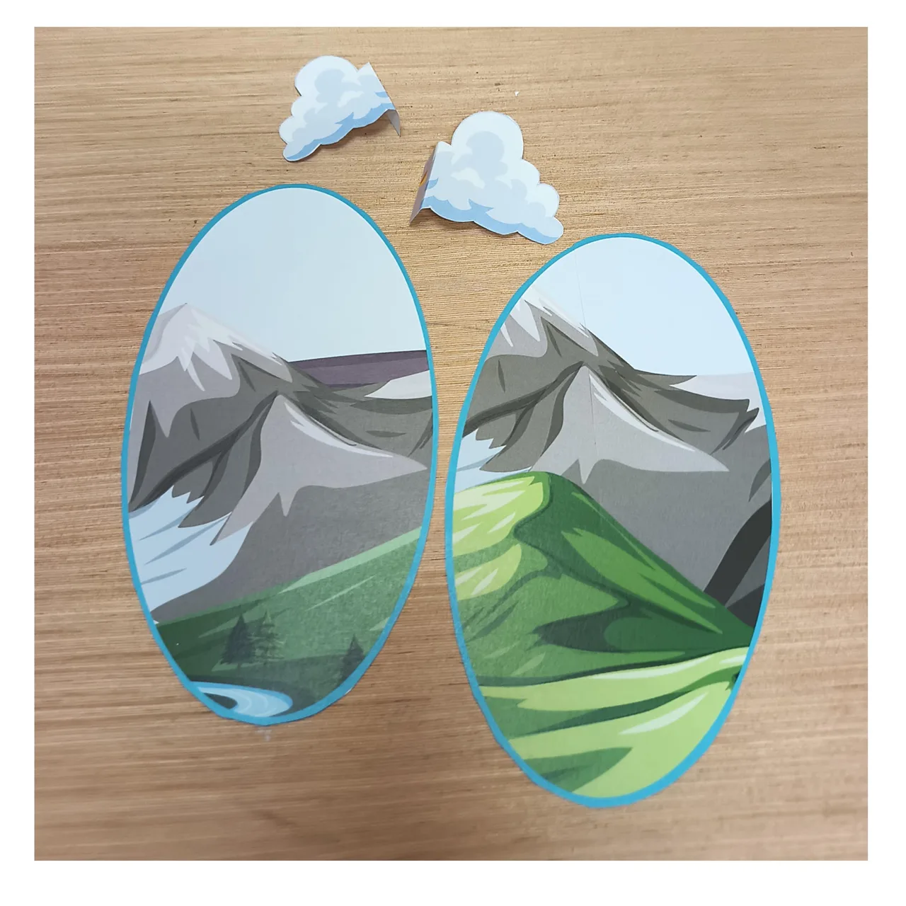 Loose mountain landscape and cloud cutouts for the box sides